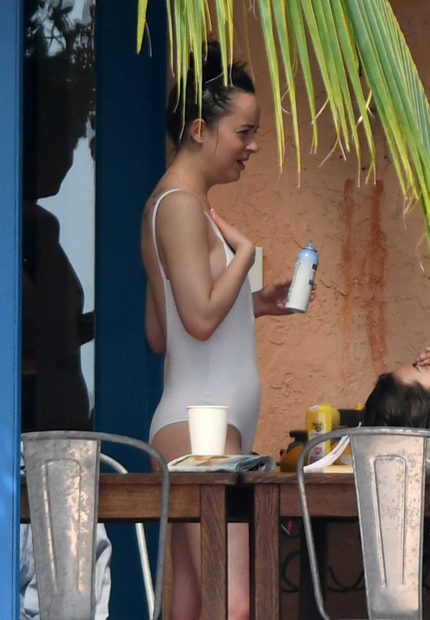 Dakota_Johnson_-_wearing_a_bikini_at_a_beach_in_Miami_on_April_2-09.jpg