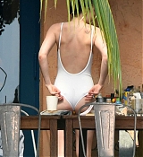 Dakota_Johnson_-_wearing_a_bikini_at_a_beach_in_Miami_on_April_2-06.jpg