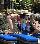 Dakota_Johnson_-_wearing_a_bikini_at_a_beach_in_Miami_on_March_31-68.jpg