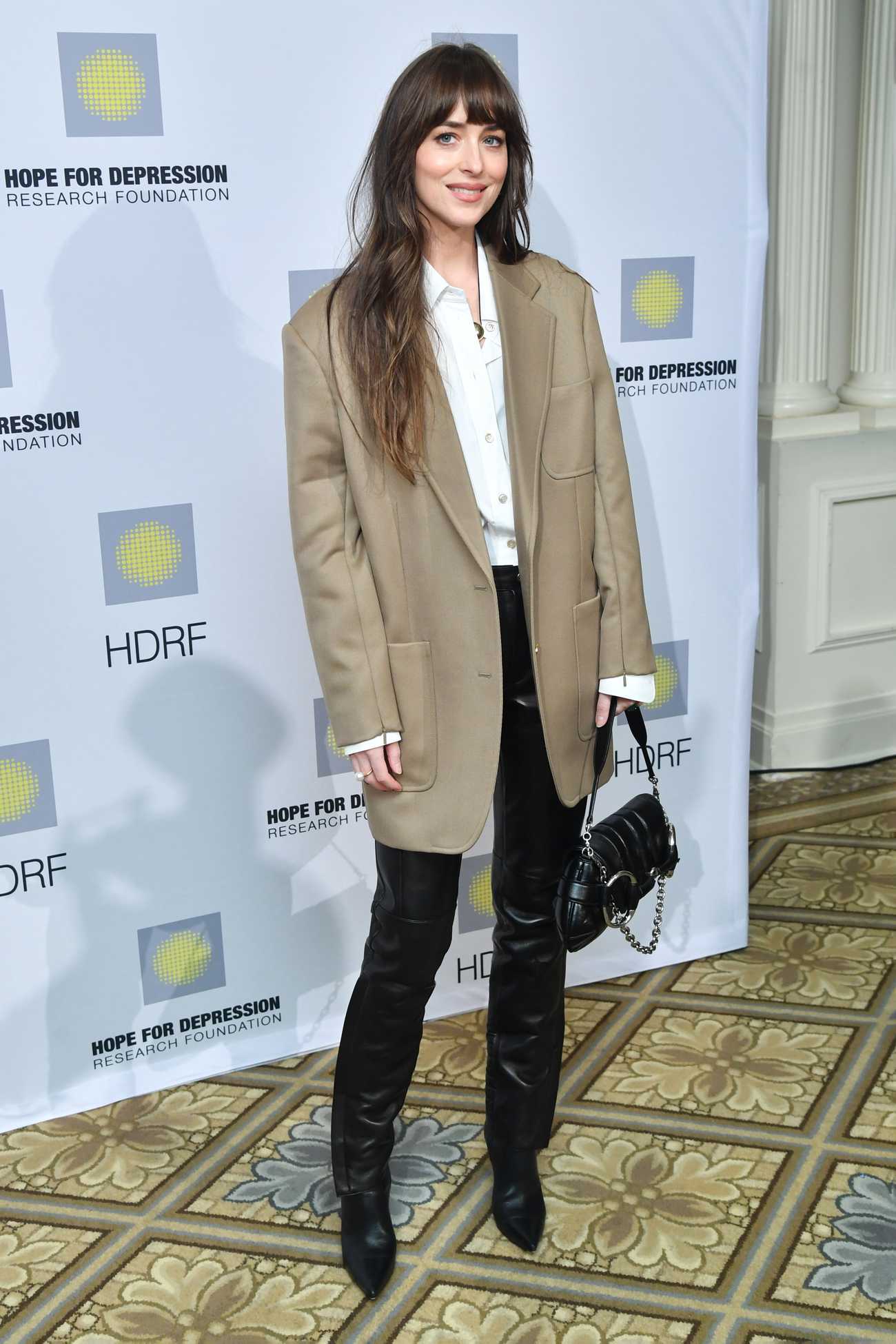 Dakota_Johnson_-_17th_Annual_HOPE_Luncheon_Seminar_in_New_York_1114202302.jpg