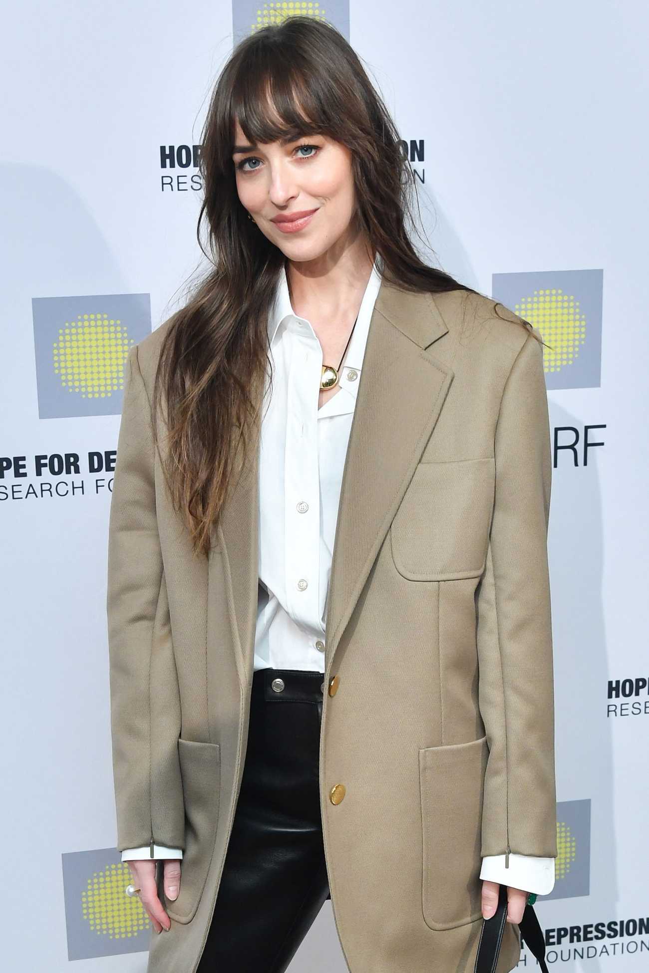 Dakota_Johnson_-_17th_Annual_HOPE_Luncheon_Seminar_in_New_York_1114202314.jpg