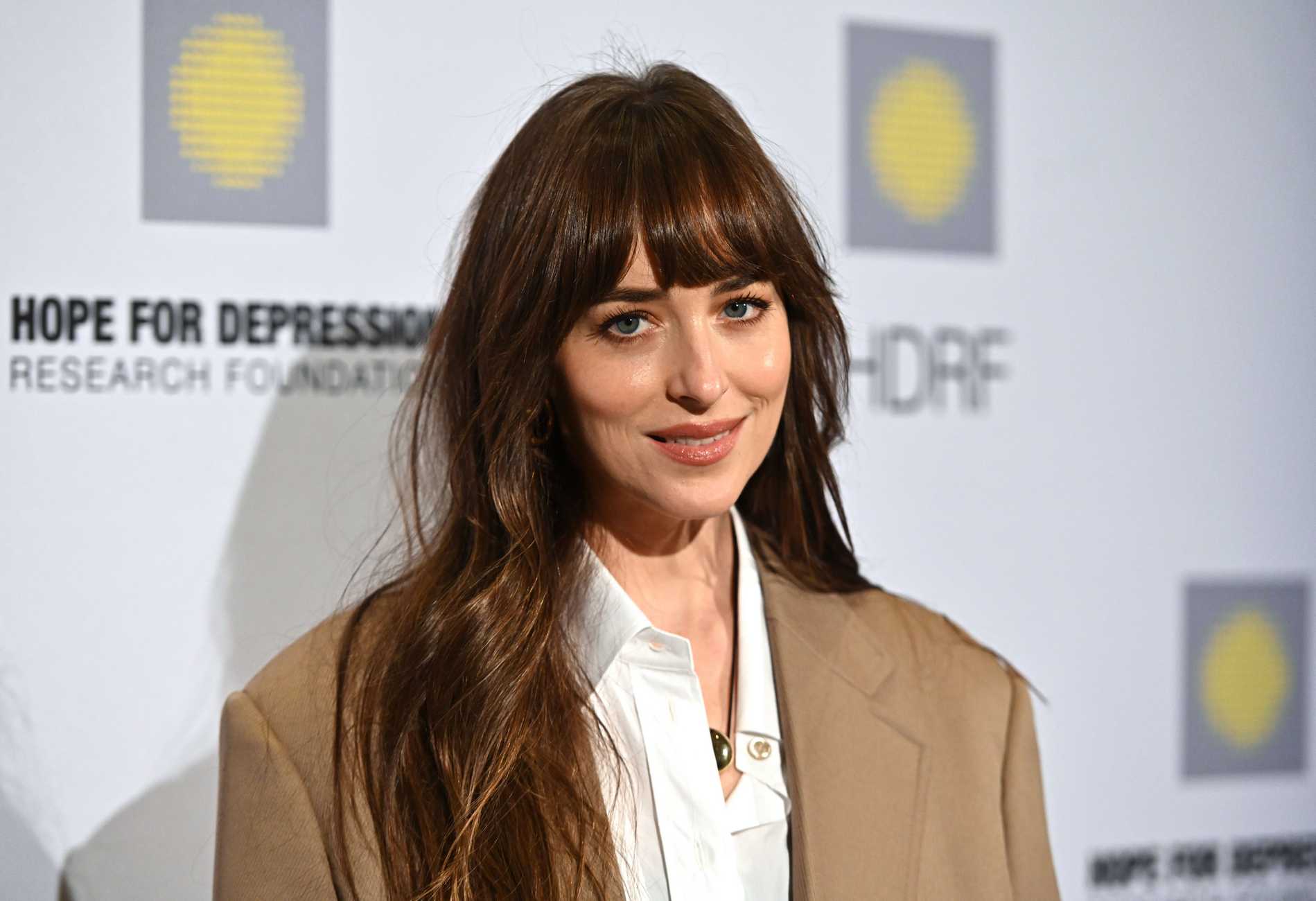 Dakota_Johnson_-_17th_Annual_HOPE_Luncheon_Seminar_in_New_York_1114202326.jpg