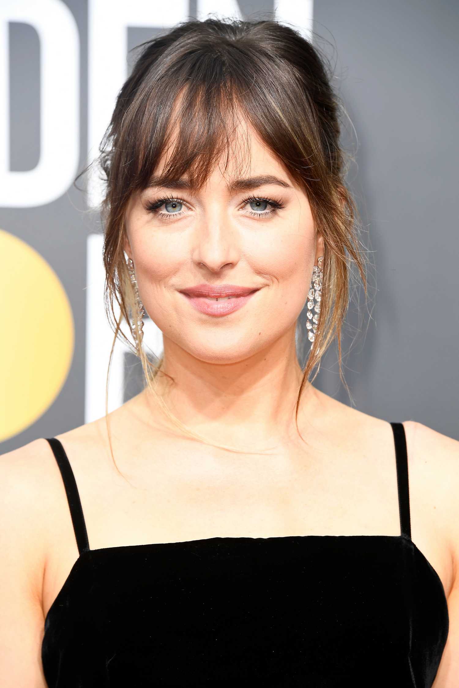 Dakota_Johnson_-_75th_Annual_Golden_Globe_Awards_on_January_7-02.jpg