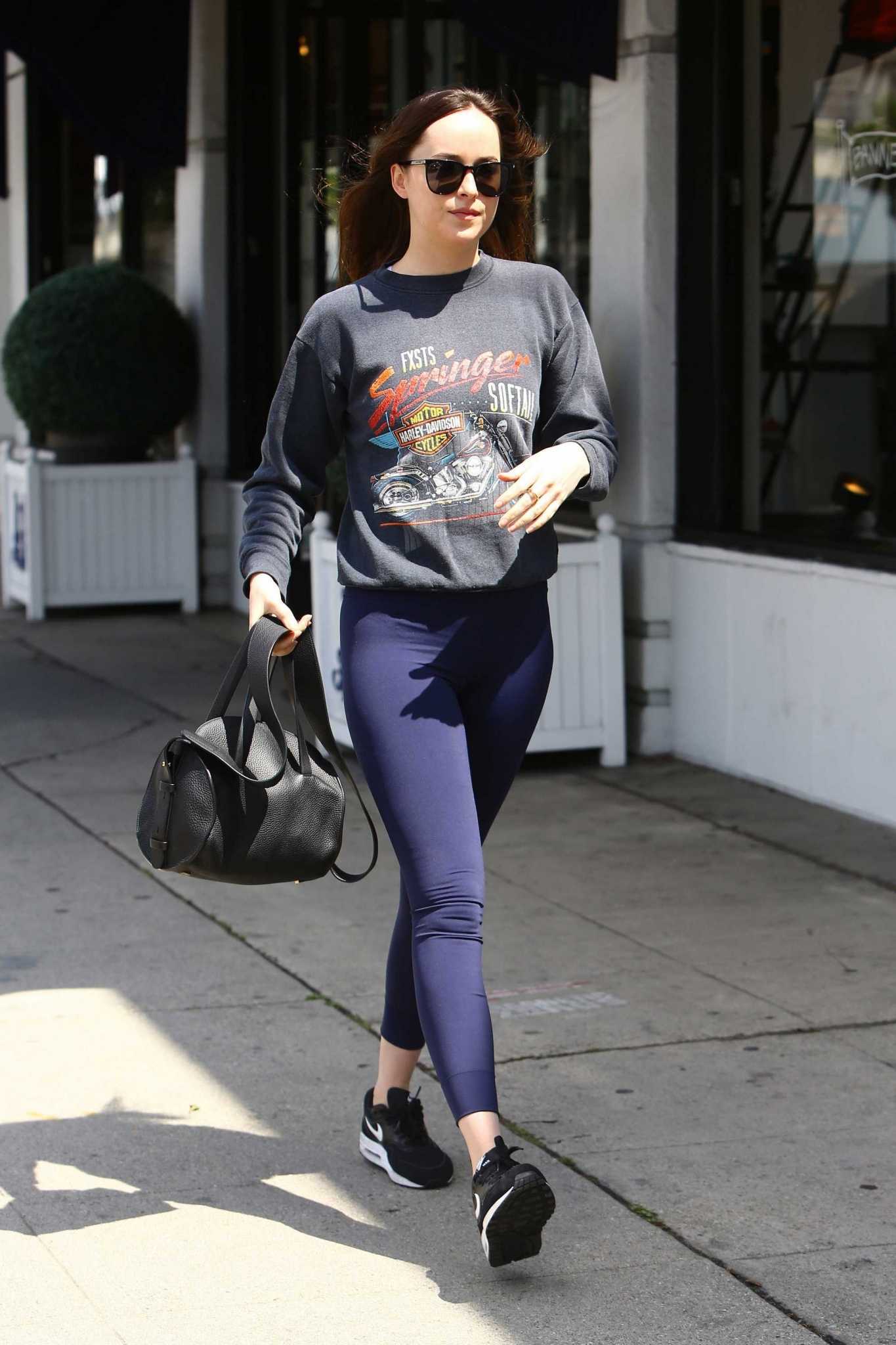 Dakota_Johnson_-_Heading_to_Cafe_Midi_in_New_York_on_April_8-12.jpg