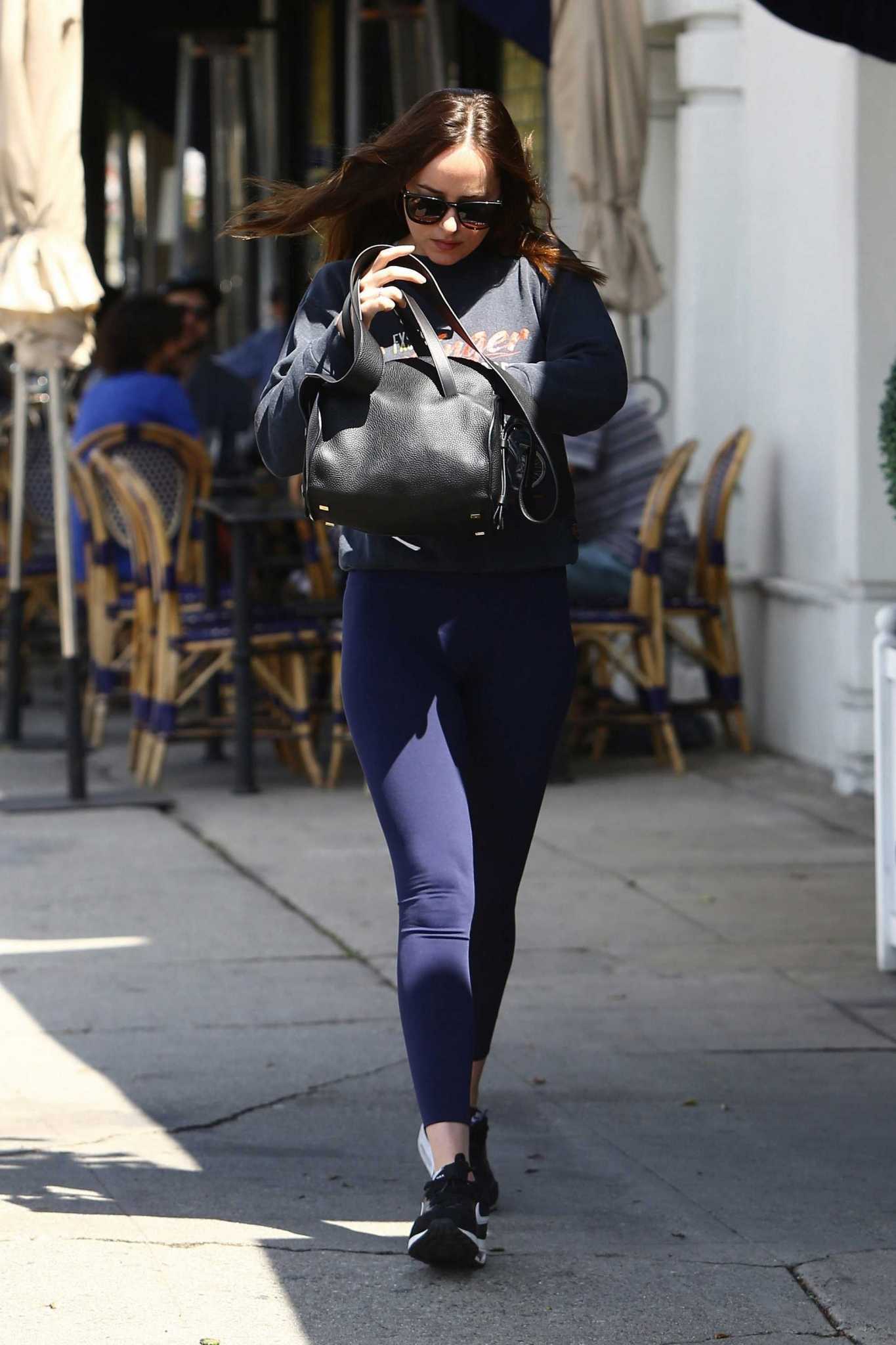 Dakota_Johnson_-_Heading_to_Cafe_Midi_in_New_York_on_April_8-30.jpg