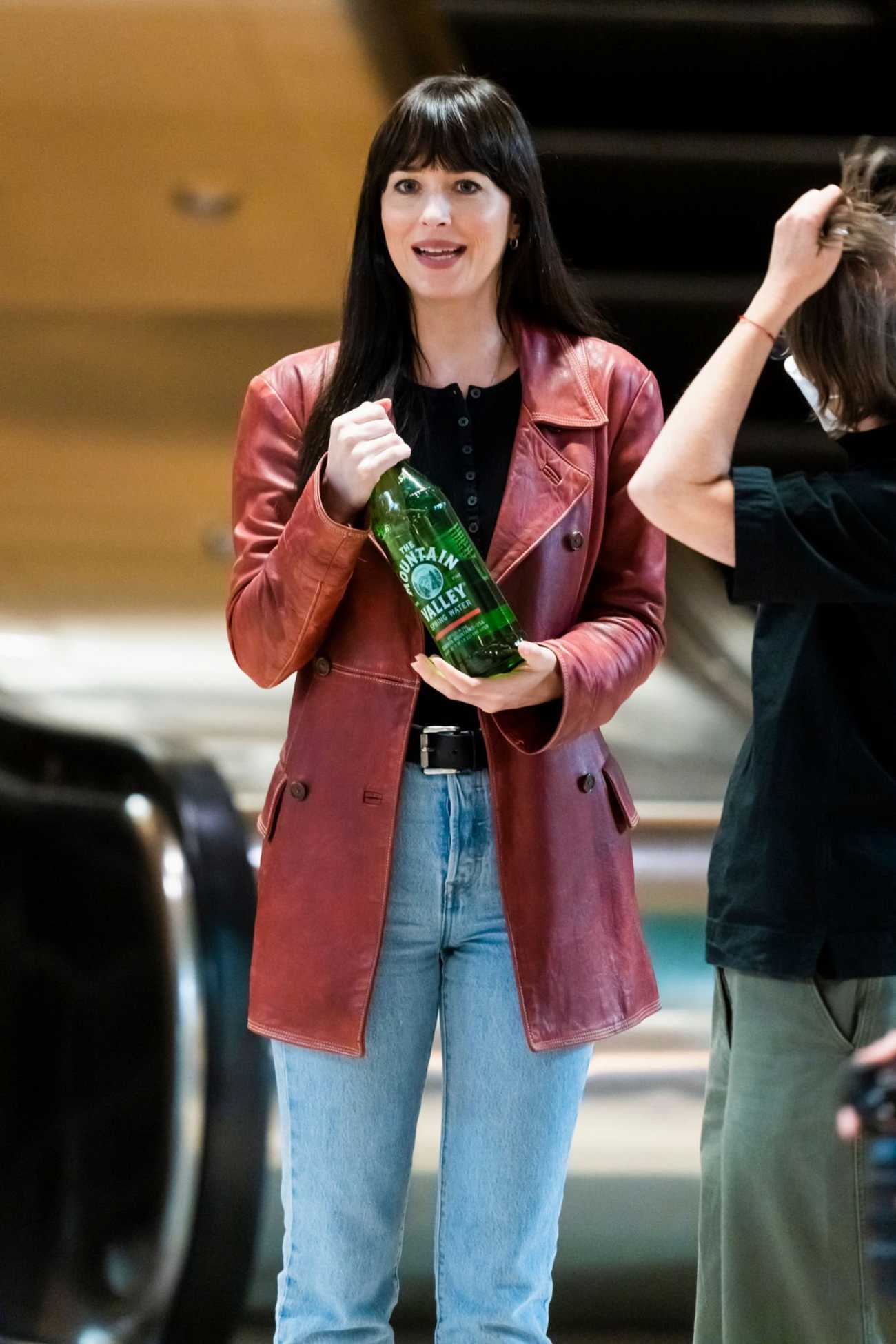 Dakota_Johnson_-_On_the_set_of__Madame_Web__in_Boston_1011202237.jpg