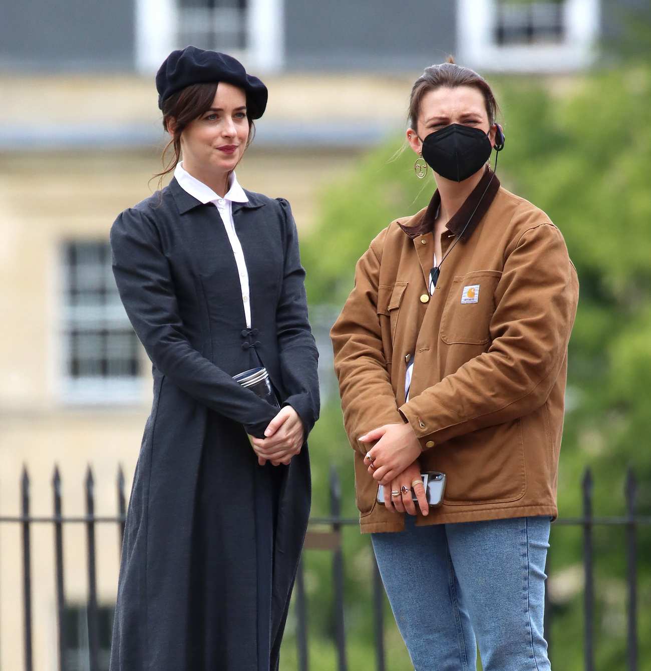 Dakota_Johnson_-_On_the_set_of__Persuasion__on_The_Royal_Crescent_In_Bath2C_UK_06242021_08.jpg