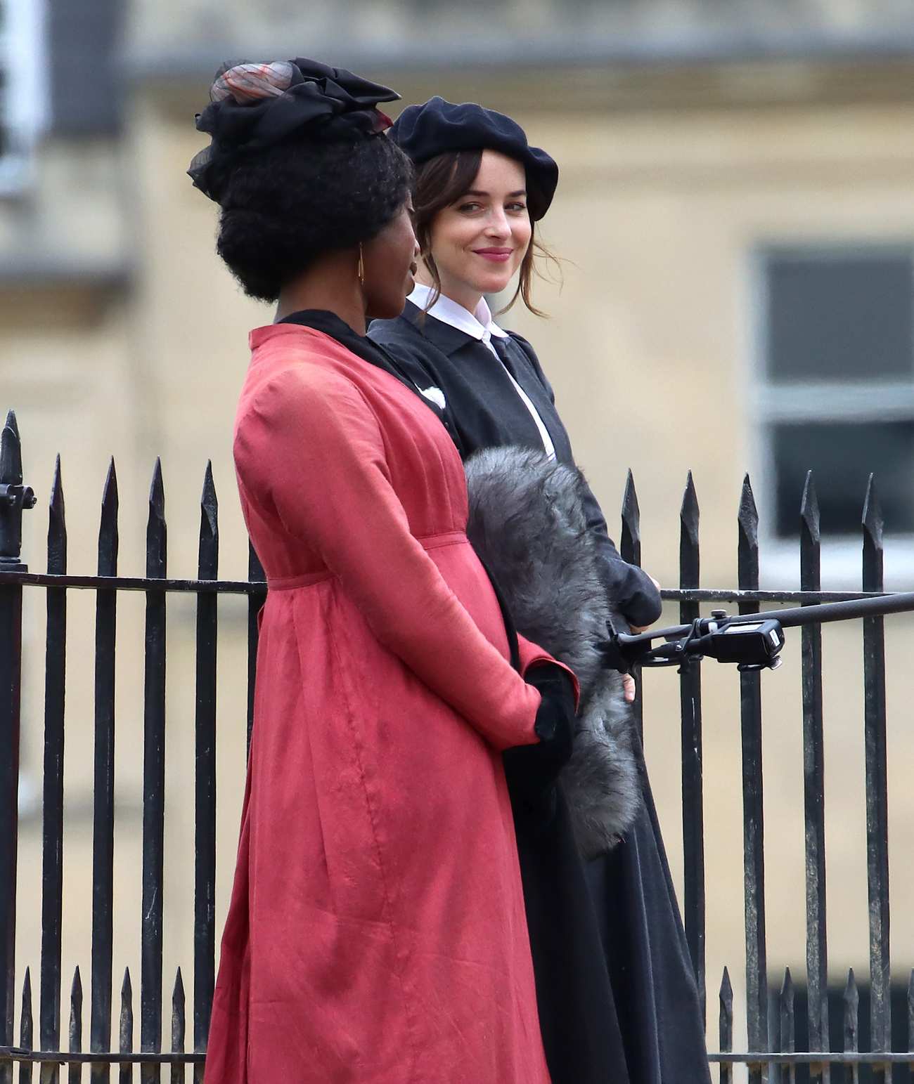 Dakota_Johnson_-_On_the_set_of__Persuasion__on_The_Royal_Crescent_In_Bath2C_UK_06242021_11.jpg