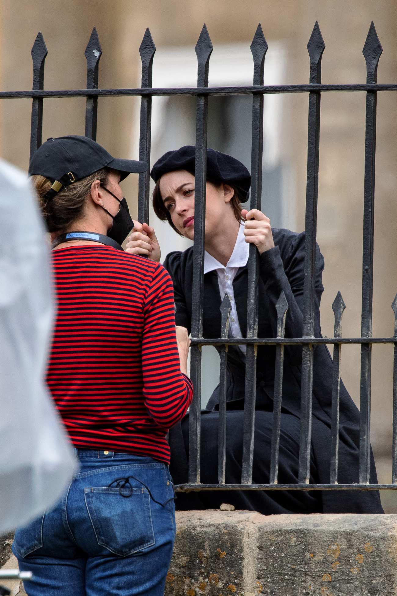 Dakota_Johnson_-_On_the_set_of__Persuasion__on_The_Royal_Crescent_In_Bath2C_UK_06242021_15.jpg