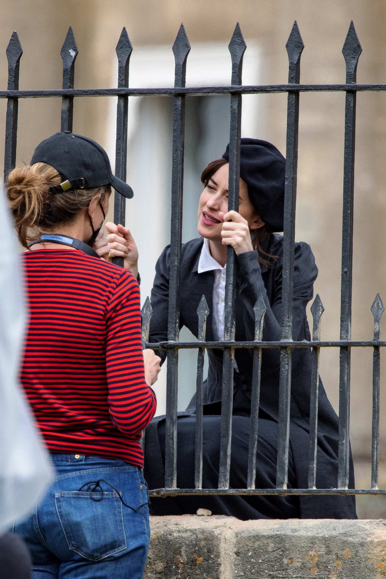 Dakota_Johnson_-_On_the_set_of__Persuasion__on_The_Royal_Crescent_In_Bath2C_UK_06242021_17.jpg