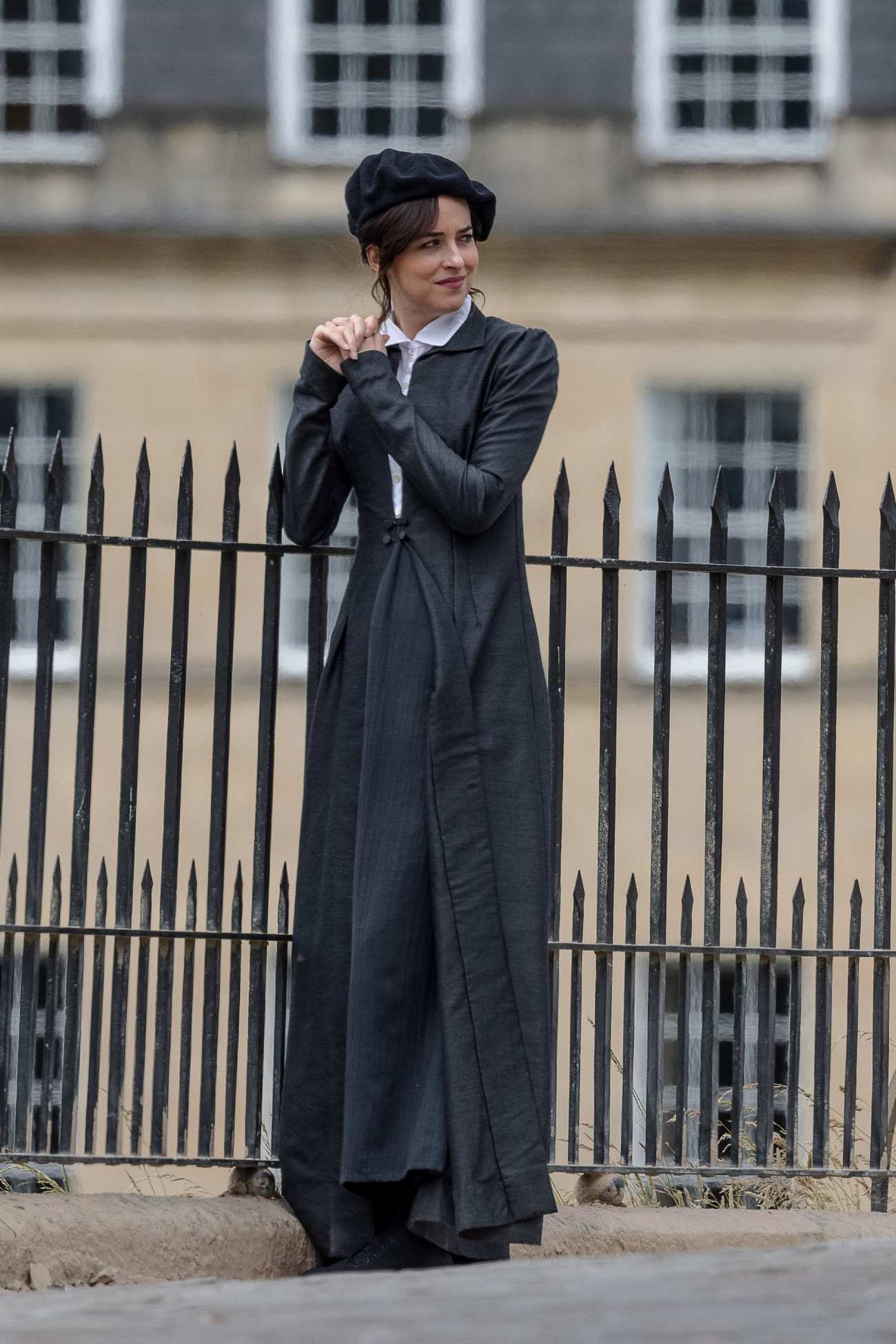 Dakota_Johnson_-_On_the_set_of__Persuasion__on_The_Royal_Crescent_In_Bath2C_UK_06242021_18.jpg