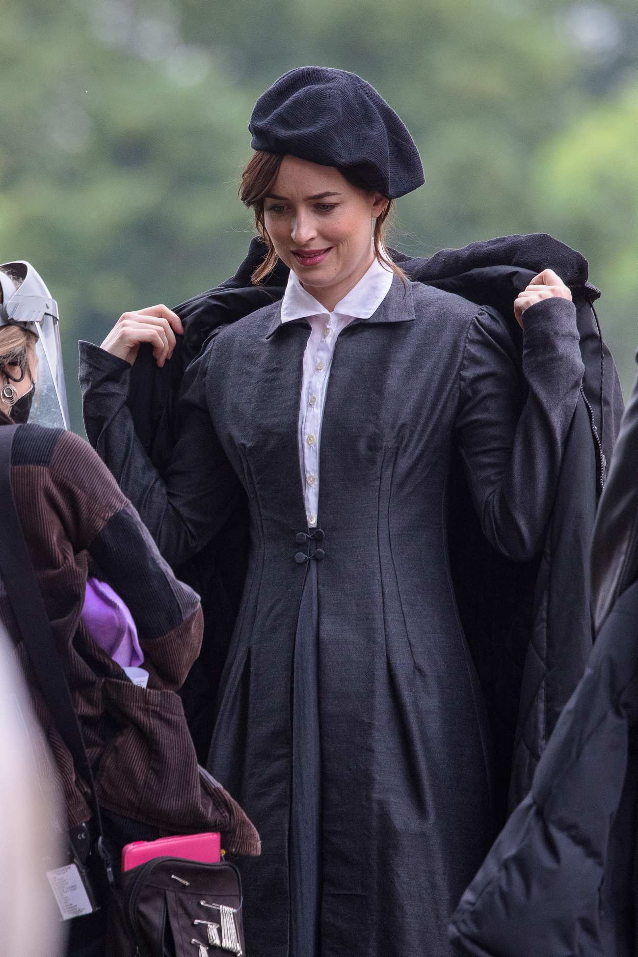 Dakota_Johnson_-_On_the_set_of__Persuasion__on_The_Royal_Crescent_In_Bath2C_UK_06242021_20.jpg