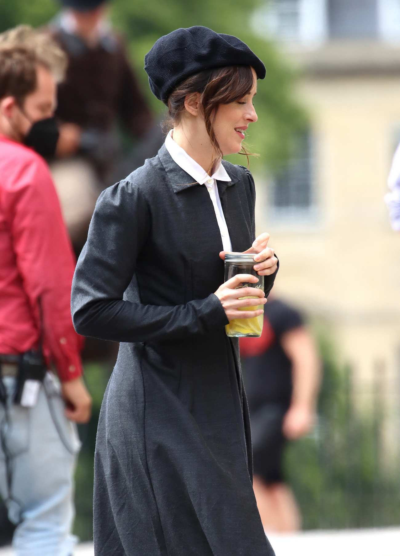 Dakota_Johnson_-_On_the_set_of__Persuasion__on_The_Royal_Crescent_In_Bath2C_UK_06242021_22.jpg