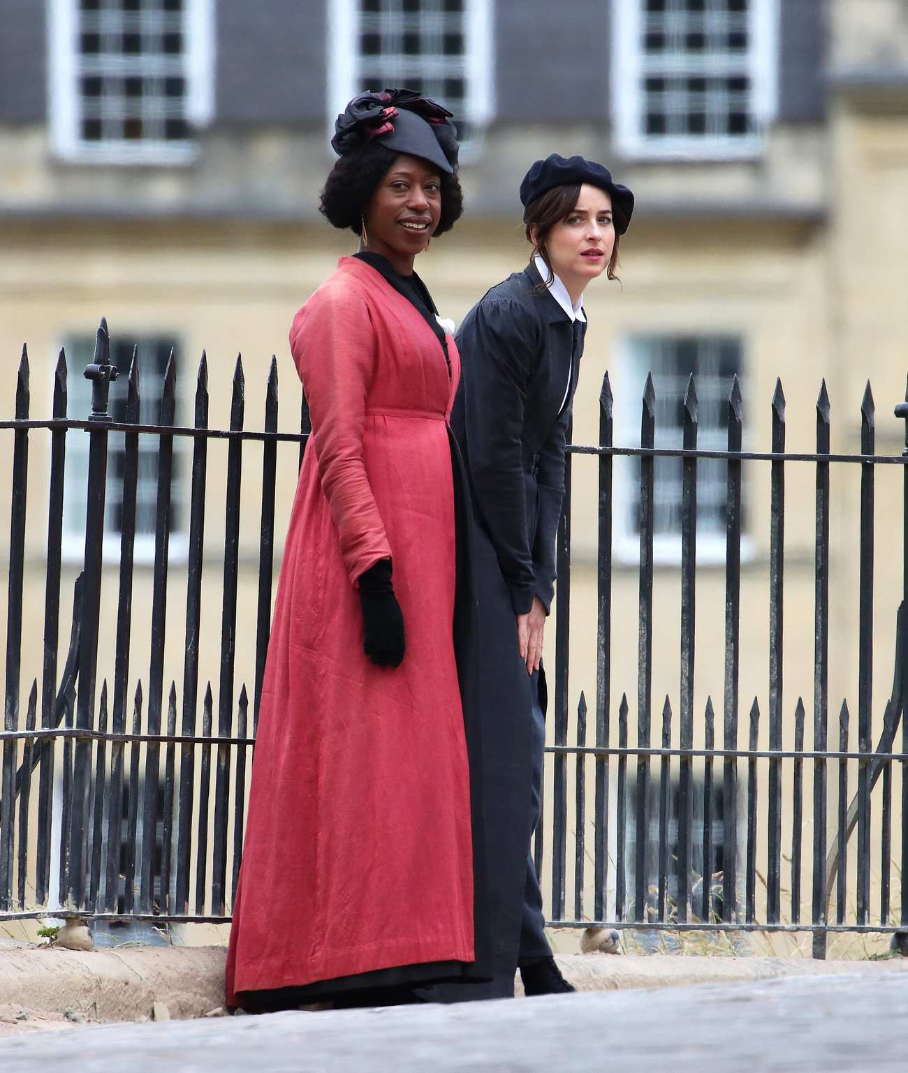 Dakota_Johnson_-_On_the_set_of__Persuasion__on_The_Royal_Crescent_In_Bath2C_UK_06242021_25.jpg