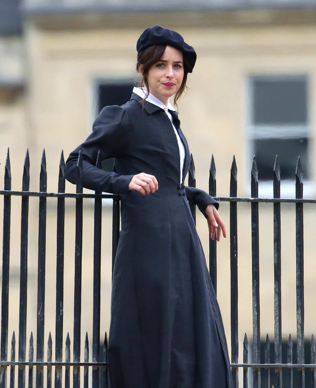 Dakota_Johnson_-_On_the_set_of__Persuasion__on_The_Royal_Crescent_In_Bath2C_UK_06242021_27.jpg