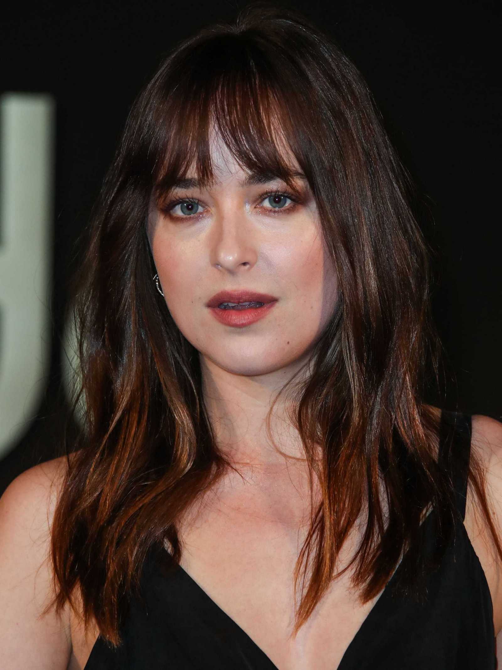 Dakota_Johnson_-_Panthere_De_Cartier_Party_In_LA_on_May_5-96.jpg