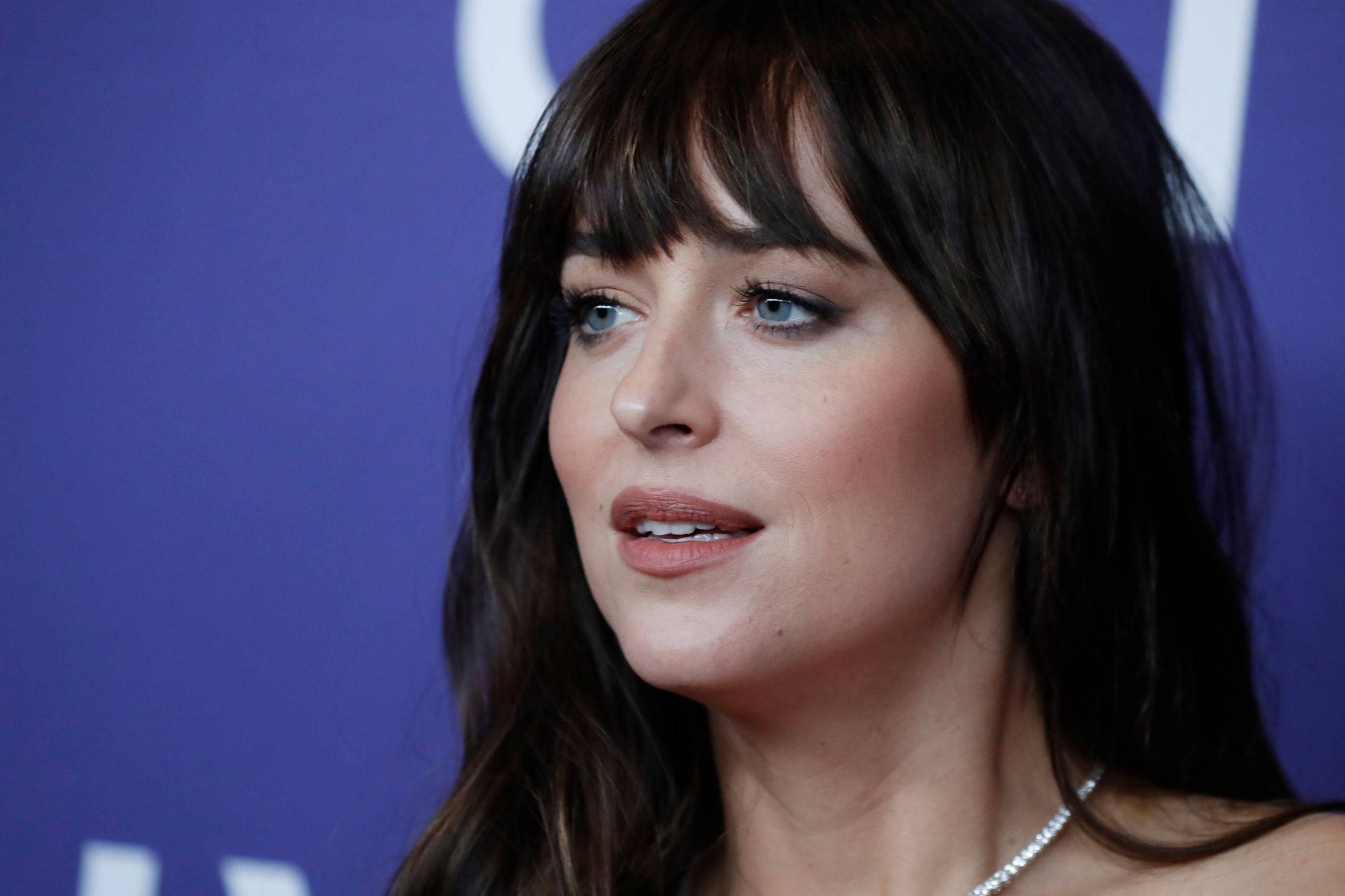 Dakota_Johnson_-_Premiere_of_The_Lost_Daughter_during_the_59th_New_York_Film_Festival2C_09292021_09.jpg