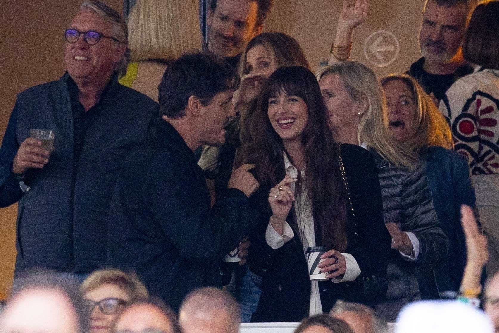 Dakota_Johnson_-_Spotted_with_Pedro_Pascal_at_Stevie_Nicks__Hyde_Park_Show_in_London2C_England_-_July_122C_2024_03.jpg Dakota_Johnson_-_Spotted_with_Pedro_Pascal_at_Stevie_Nicks__Hyde_Park_Show_in_London2C_England_-_July_122C_2024_03.jpg