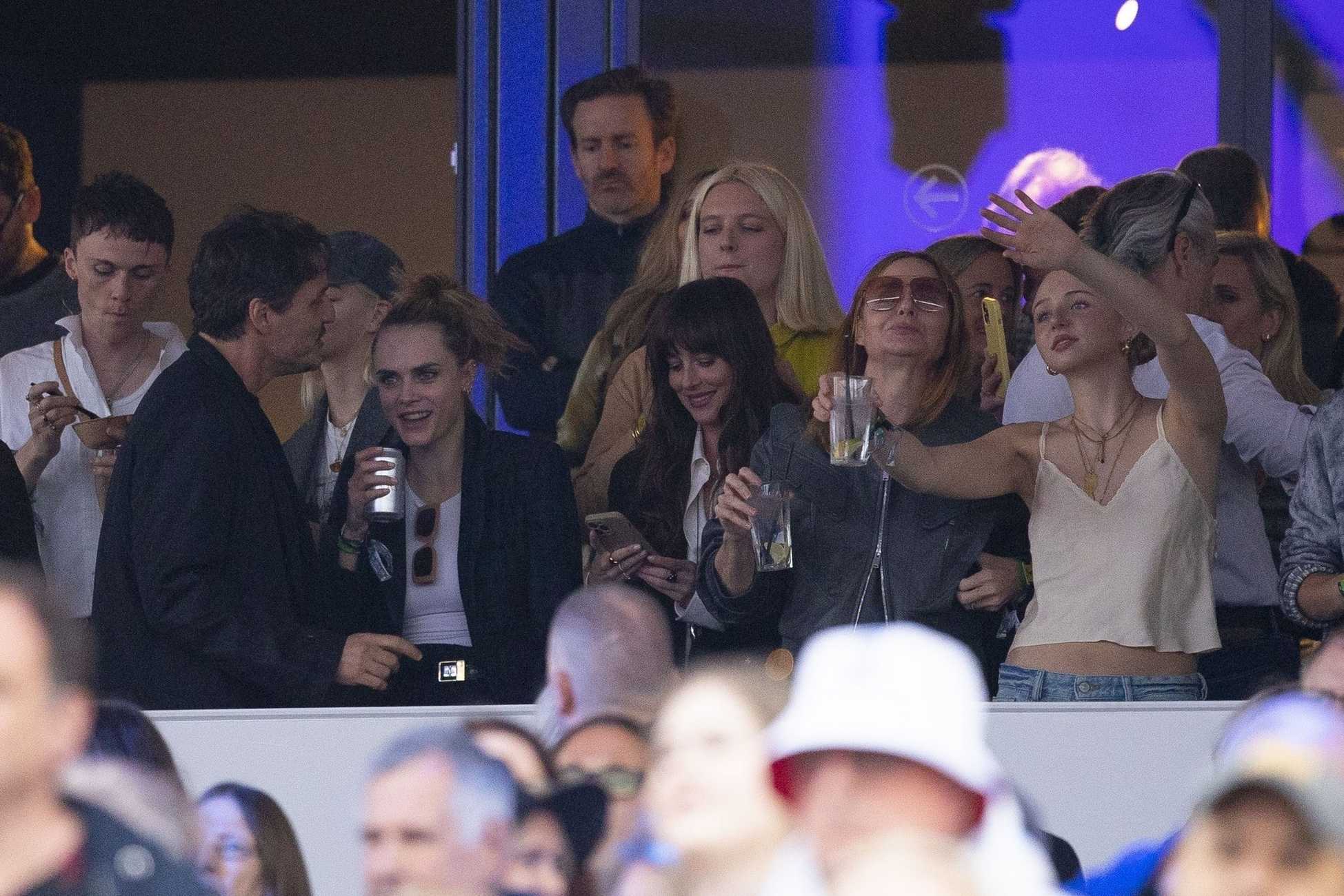 Dakota_Johnson_-_Spotted_with_Pedro_Pascal_at_Stevie_Nicks__Hyde_Park_Show_in_London2C_England_-_July_122C_2024_06.jpg Dakota_Johnson_-_Spotted_with_Pedro_Pascal_at_Stevie_Nicks__Hyde_Park_Show_in_London2C_England_-_July_122C_2024_06.jpg
