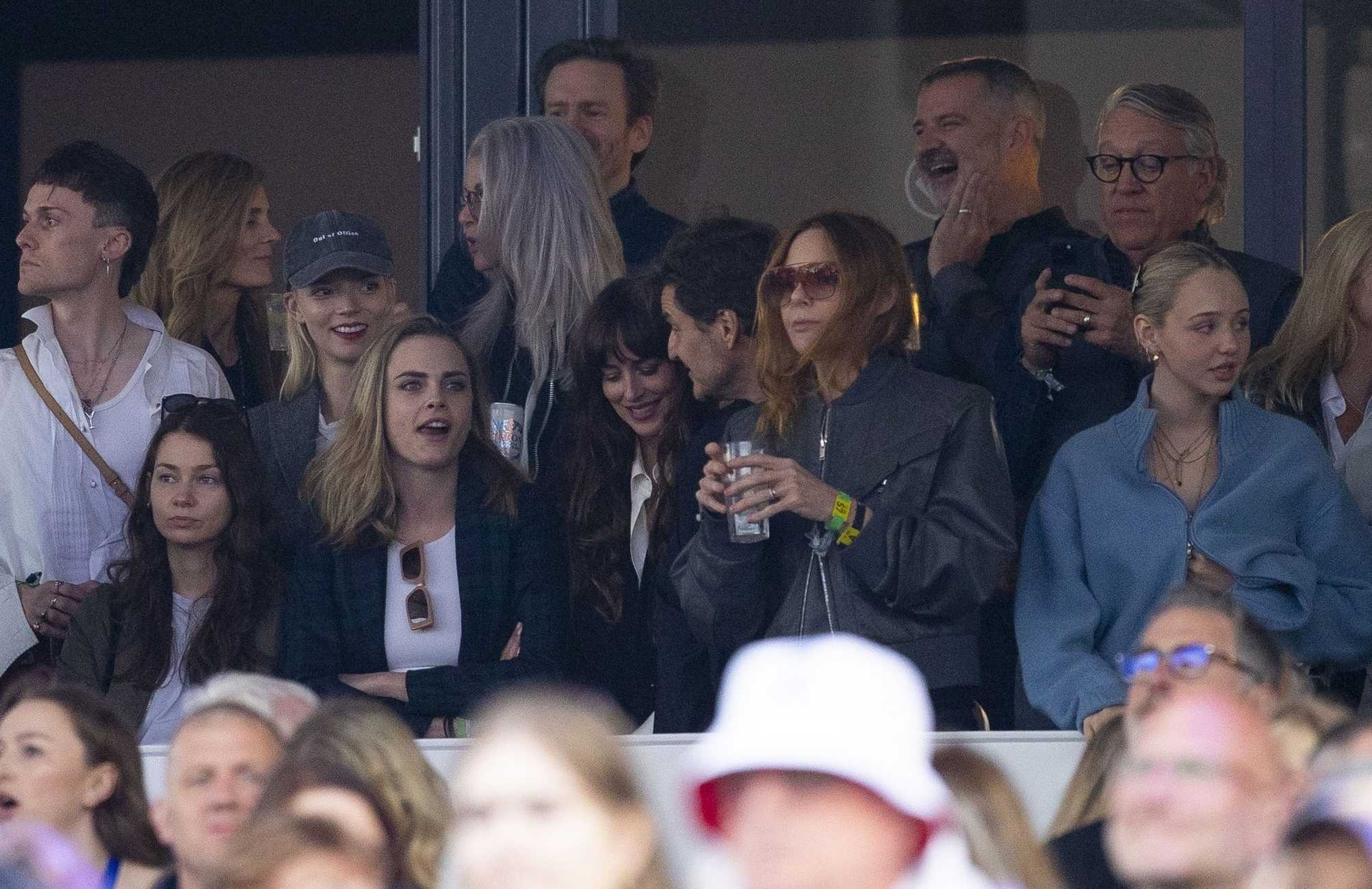 Dakota_Johnson_-_Spotted_with_Pedro_Pascal_at_Stevie_Nicks__Hyde_Park_Show_in_London2C_England_-_July_122C_2024_08.jpg Dakota_Johnson_-_Spotted_with_Pedro_Pascal_at_Stevie_Nicks__Hyde_Park_Show_in_London2C_England_-_July_122C_2024_08.jpg