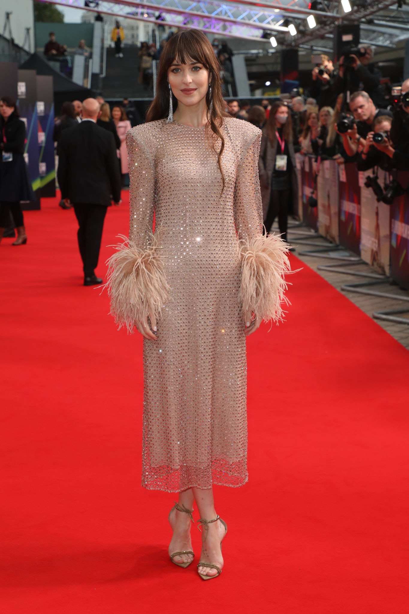 Dakota_Johnson_-_The_Lost_Daughter_Premiere_at_the_65th_BFI_London_Film_Festival_on_October_132C_2021_12.jpg
