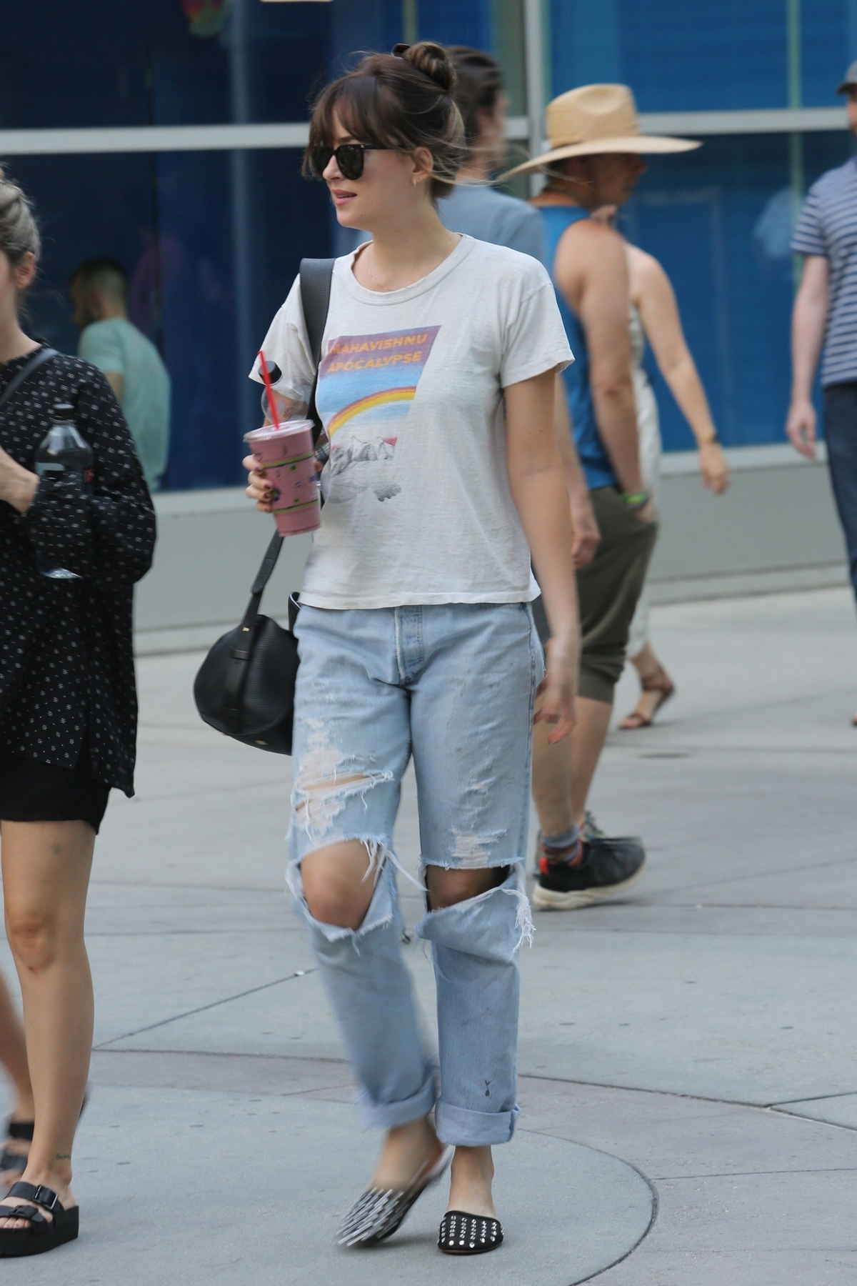 Dakota_Johnson_-_at_the_Arclight_Cinemas_with_her_friend_Addison_Timlin_in_Hollywood_-_July_600004.jpg