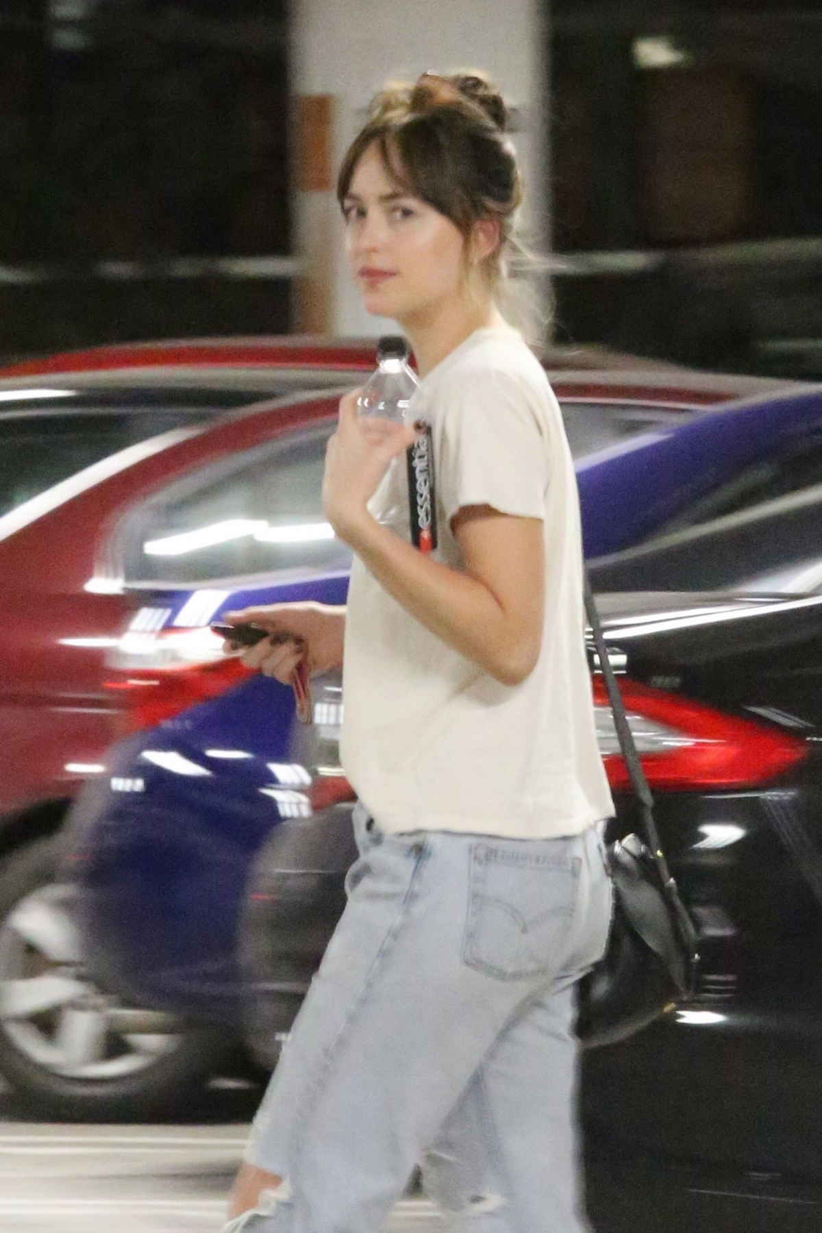 Dakota_Johnson_-_at_the_Arclight_Cinemas_with_her_friend_Addison_Timlin_in_Hollywood_-_July_600007.jpg