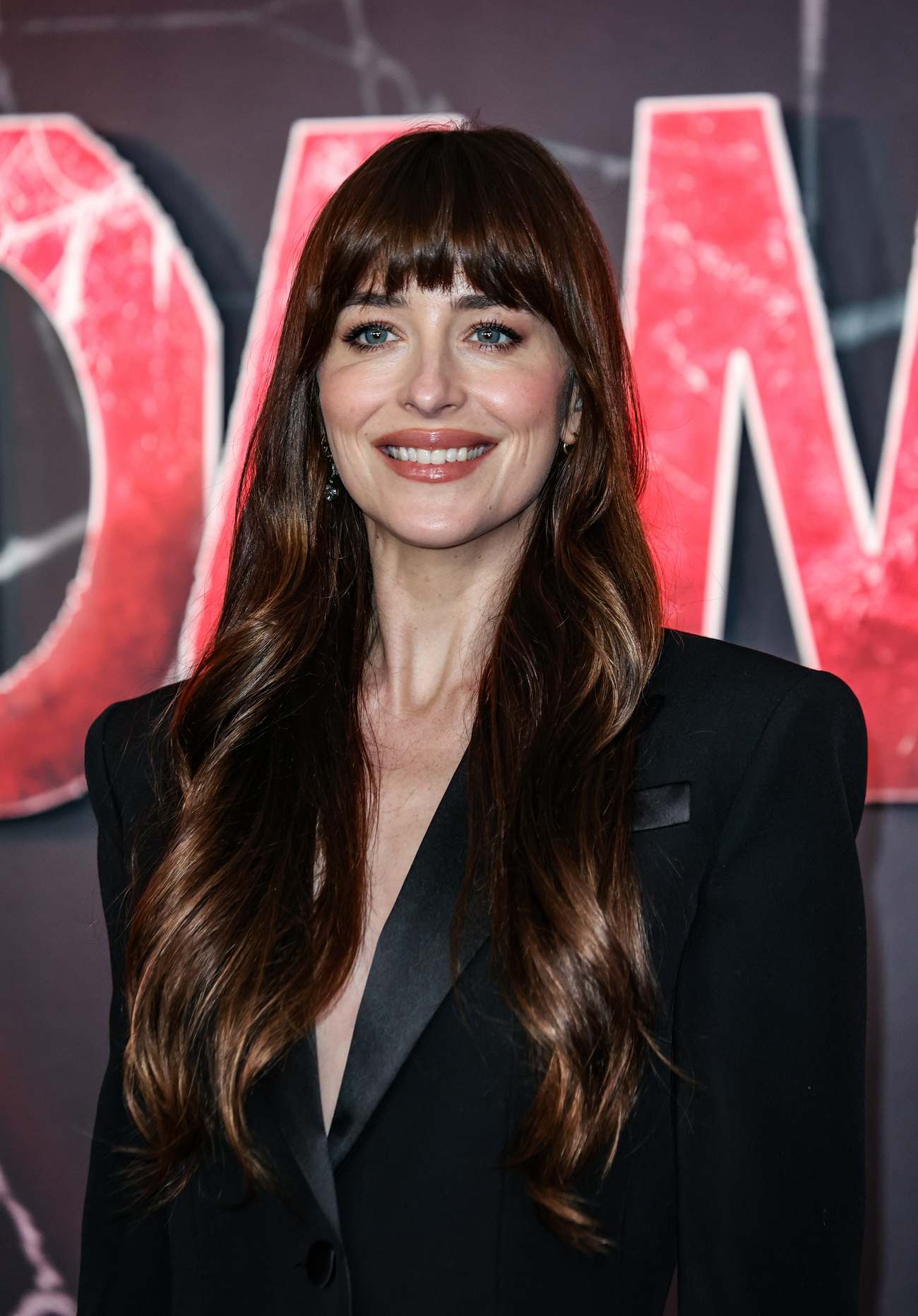 Dakota_Johnson_-_at_the_Madame_Web_photocall_in_London_0131202435.jpg