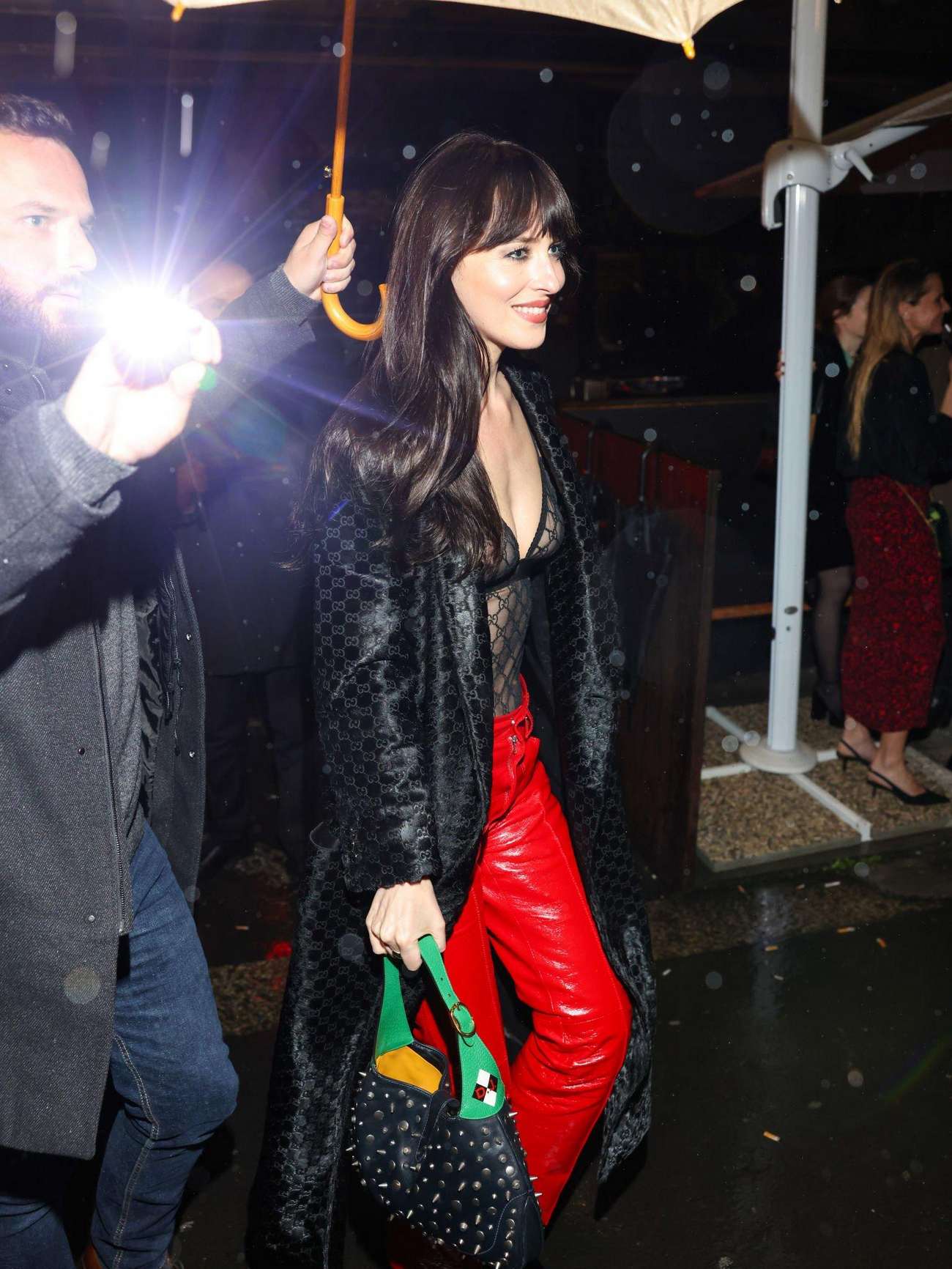 Dakota_Johnson_-_is_seen_at_the_Gucci_afterparty_on_February_242C_2023_in_Milan2C_Italy01.jpg