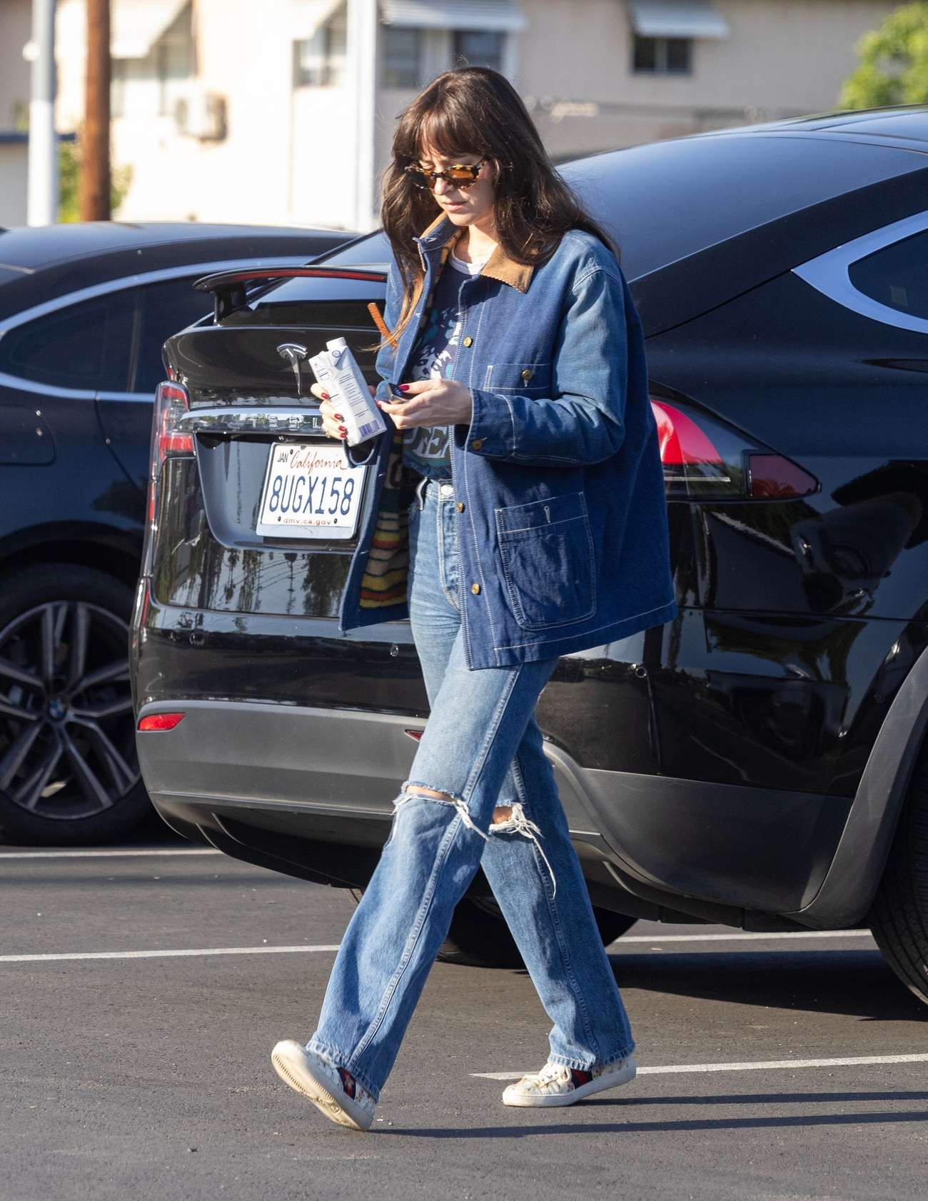 Dakota_Johnson_-_is_seen_out_and_about_running_errands_in_Los_Angeles2C_California__0513202302.jpg