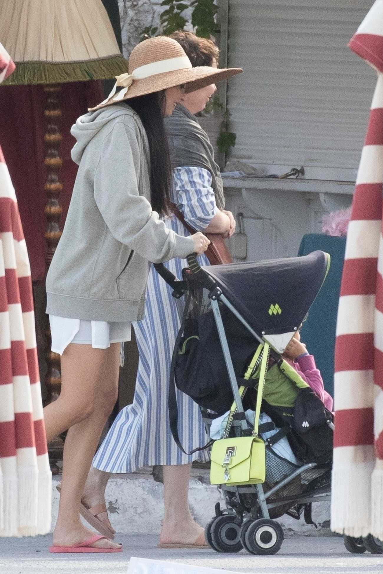 Dakota_Johnson_-_seen_shooting__The_Lost_Daughter__in_Speteses_Island2C_Greece__10202020-08.jpg