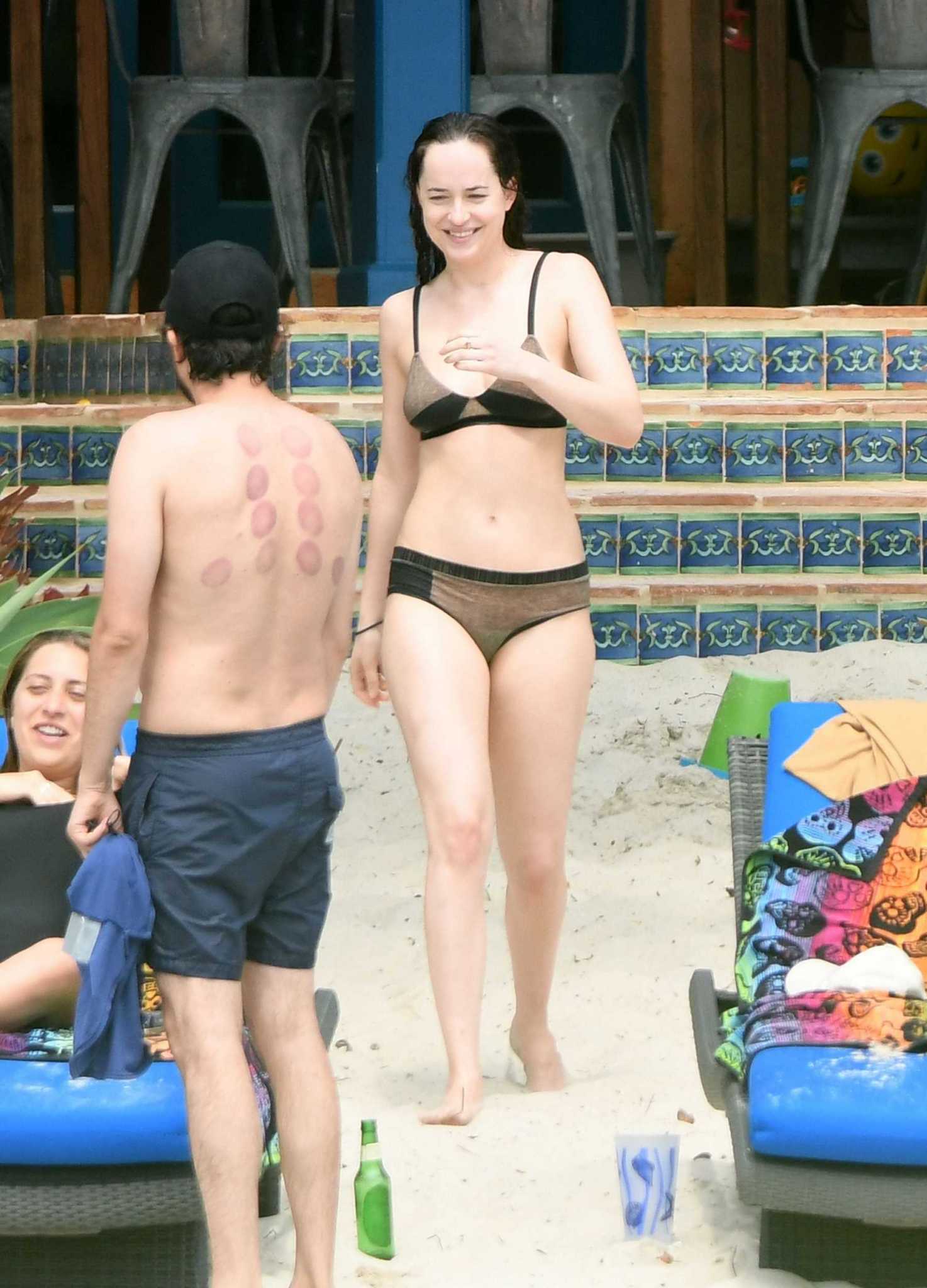 Dakota_Johnson_-_wearing_a_bikini_at_a_beach_in_Miami_on_April_4-52.jpg