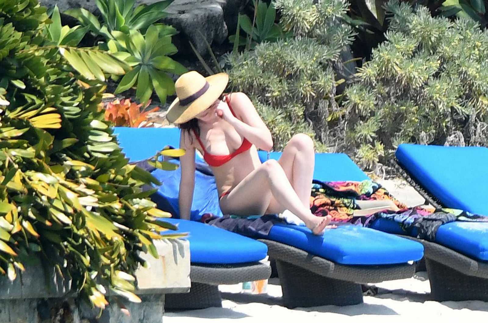 Dakota_Johnson_-_wearing_a_bikini_at_a_beach_in_Miami_on_March_31-61.jpg