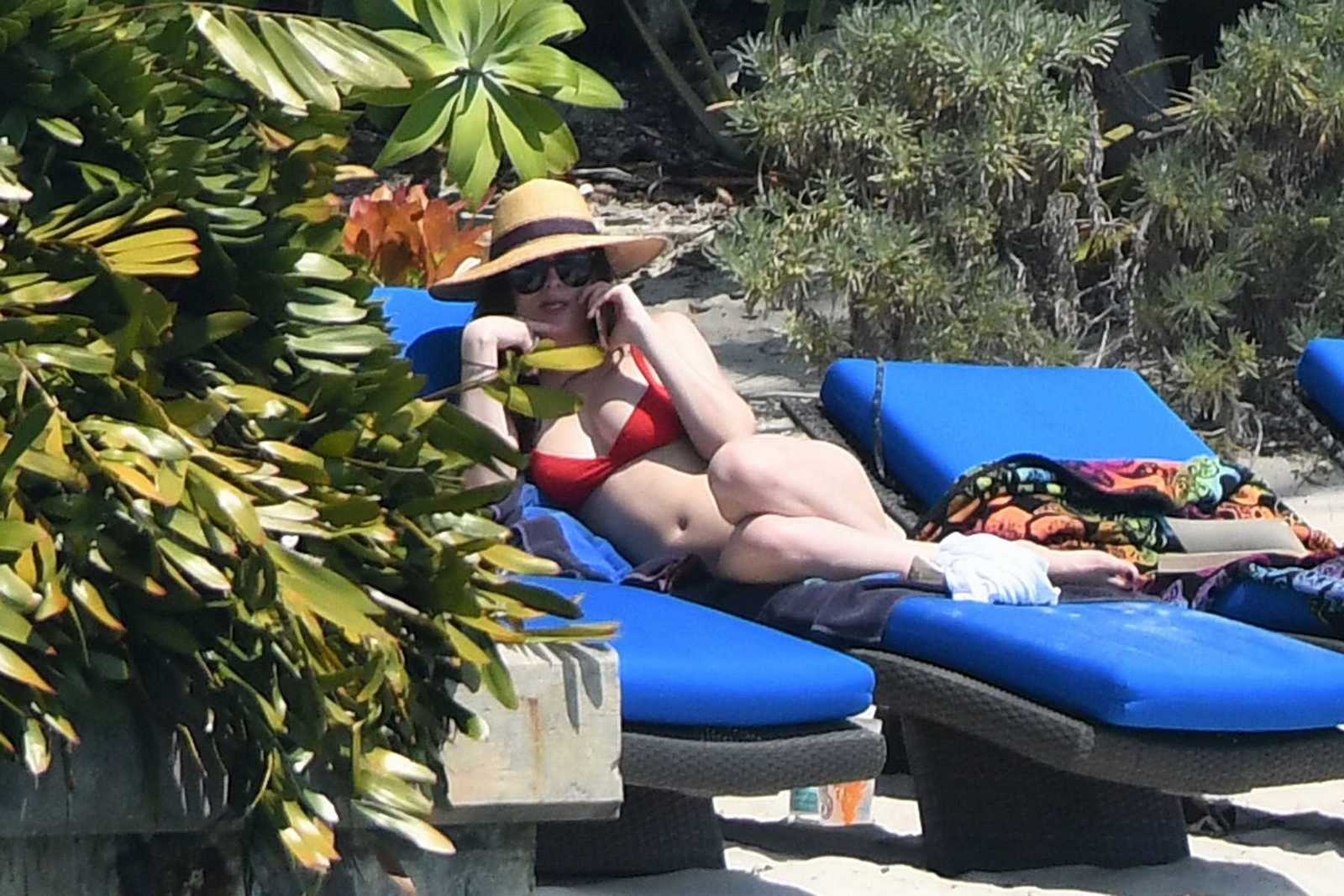 Dakota_Johnson_-_wearing_a_bikini_at_a_beach_in_Miami_on_March_31-67.jpg Dakota_Johnson_-_wearing_a_bikini_at_a_beach_in_Miami_on_March_31-67.jpg