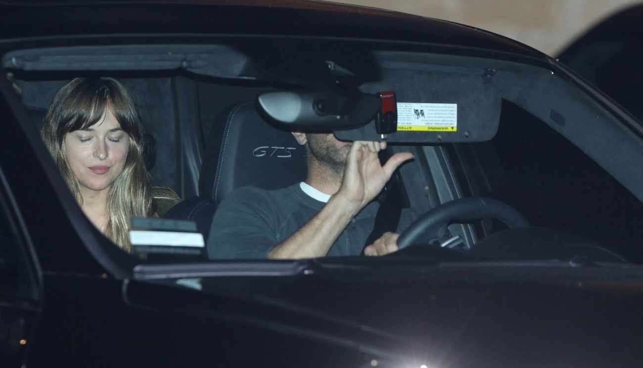 Dakota_Johnson_and_Chris_Martin_seen_leaving_the_Soho_in_Malibu_-_June_1500002.jpg