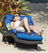 Dakota_Johnson_-_wearing_a_bikini_at_a_beach_in_Miami_on_April_2-143.jpg